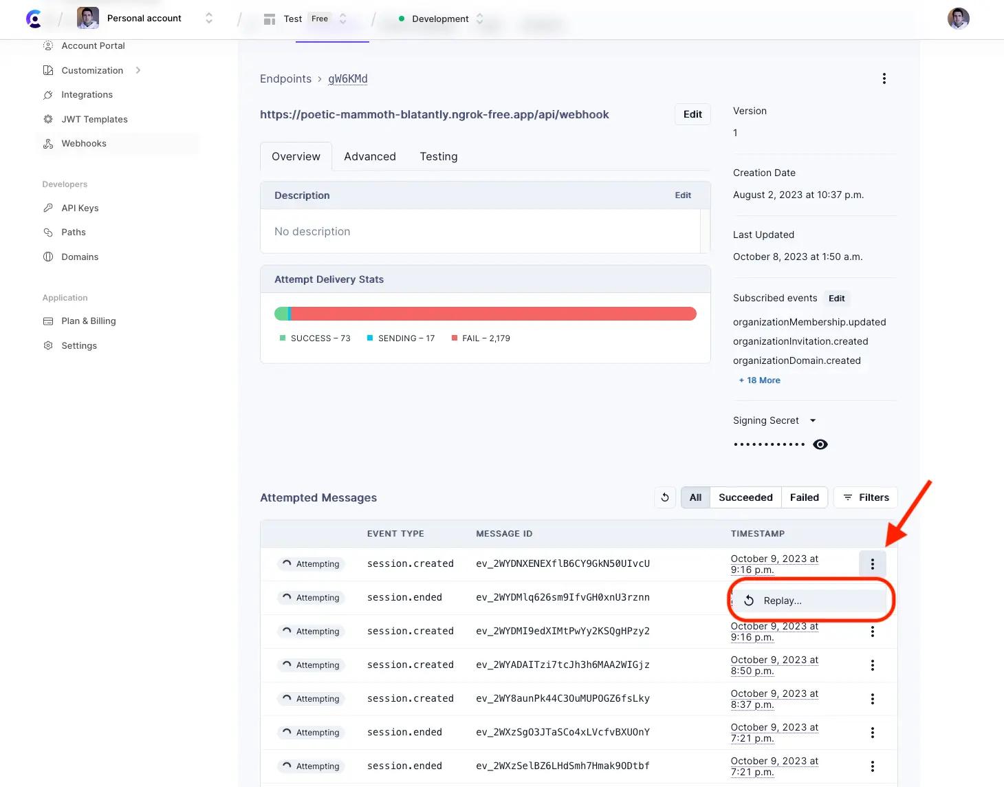 The Webhooks page of the Clerk Dashboard. There is a red arrow pointing to the Replay option for a failed webhook message. There is a red box around the 'Replay' button.